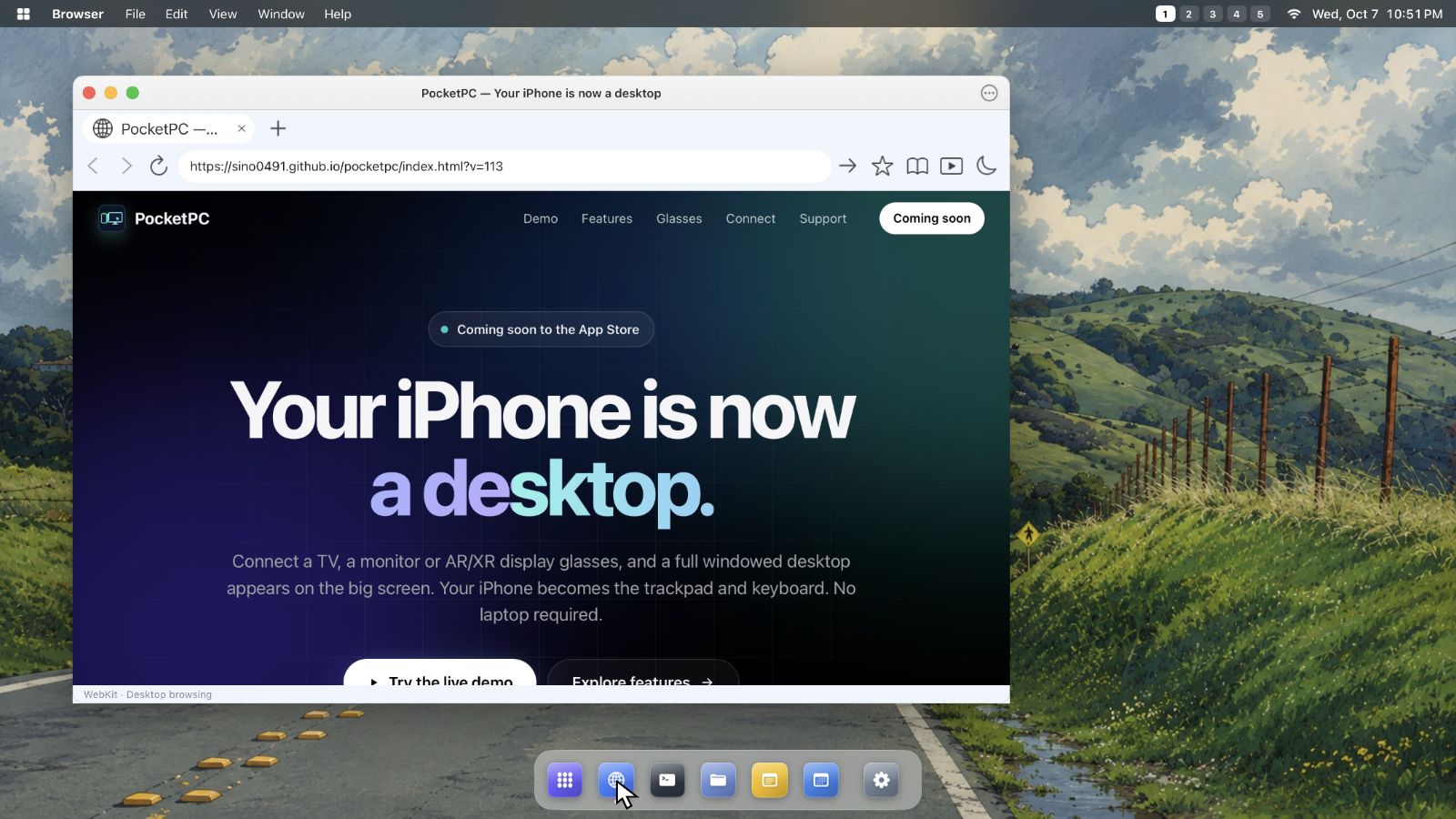 PocketPC filling an external display: the Browser window showing a full desktop website above the Dock.